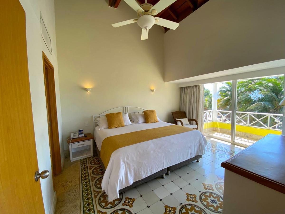 Hotel Las Americas Casa De Playa Cartagena ภายนอก รูปภาพ A bedroom at the hotel